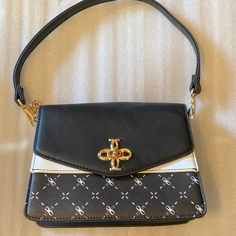 Elegant Black and White Handbag with Gold Chain Length Shoulder Strap Never Used